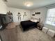 Cozy bedroom with a TV and ample storage at 4390 Bull St, St Cloud, FL 34772