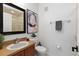 Small bathroom with toilet and sink at 4713 Anson Ln, Orlando, FL 32814