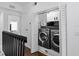 Convenient laundry closet with washer and dryer at 4713 Anson Ln, Orlando, FL 32814