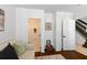 Living room with comfortable sofa and half bath at 4713 Anson Ln, Orlando, FL 32814