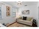 Small office space with sofa and neutral decor at 4713 Anson Ln, Orlando, FL 32814