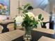 View of a floral arrangement on a dining table at 5381 Via Appia Way, Sanford, FL 32771