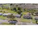 An aerial view of the property with a pond in the background at 608 S Oxalis Ave, Orlando, FL 32807