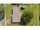 Aerial view of the home showcasing the roof, backyard, and surrounding landscape at 608 S Oxalis Ave, Orlando, FL 32807