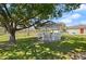 Backyard featuring a gazebo and a large shade tree, offering great outdoor living space at 608 S Oxalis Ave, Orlando, FL 32807