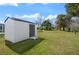 Backyard shed, offering extra storage space on a well-kept, spacious lot at 608 S Oxalis Ave, Orlando, FL 32807
