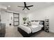 Comfortable bedroom featuring modern decor, recessed lighting, ceiling fan and carpet floors at 608 S Oxalis Ave, Orlando, FL 32807