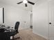 Neutral bedroom featuring a ceiling fan and neutral carpet at 608 S Oxalis Ave, Orlando, FL 32807