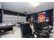 A recreational room with arcade games, air hockey and a pool table at 7600 Mackinaw Ln, Kissimmee, FL 34747