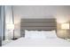 Serene bedroom with a gray headboard and matching nightstands at 7600 Mackinaw Ln, Kissimmee, FL 34747