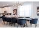 Dining area with modern lighting and ample seating at 7600 Mackinaw Ln, Kissimmee, FL 34747