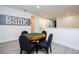 Open concept game room area with a poker table and chairs at 7600 Mackinaw Ln, Kissimmee, FL 34747