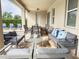 Outdoor patio with a seating and dining area, perfect for enjoying the serene outdoor view at 7600 Mackinaw Ln, Kissimmee, FL 34747