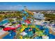 Community water park with colorful slides, splash zones, and a lazy river, perfect for Gathering fun and relaxation at 7600 Mackinaw Ln, Kissimmee, FL 34747