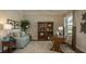 Bright home office with built-in shelving, hardwood floors, and a desk at Tbd Palm Ave, Leesburg, FL 34748