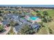Overhead shot of the clubhouse amenities, including a pool and lush landscaping at 1012 Everest St, Clermont, FL 34711