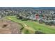 This property offers serene golf course living with lush tree coverage and nearby golf sand traps at 1012 Everest St, Clermont, FL 34711
