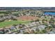 Community view with golf course and lake at 1012 Everest St, Clermont, FL 34711