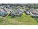 This home features a screened-in lanai and a well-manicured lawn, perfect for outdoor living at 1012 Everest St, Clermont, FL 34711