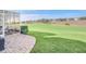 Paver patio with a golf course view at 1012 Everest St, Clermont, FL 34711