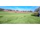 Sprawling lawn with a golf course backdrop at 1012 Everest St, Clermont, FL 34711