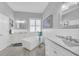 Bright and airy bathroom with a freestanding tub, double vanity, and modern fixtures, offering a spa-like experience at 1012 Everest St, Clermont, FL 34711