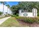 Welcoming entrance to Summit Greens with lush landscaping and manicured grounds at 1012 Everest St, Clermont, FL 34711