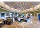 Spacious community room featuring elegant furnishings and a cozy fireplace at 1012 Everest St, Clermont, FL 34711