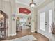 Bright living room with lots of natural light and an arched doorway at 1012 Everest St, Clermont, FL 34711