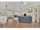 Spacious living room with tile floors, a fireplace, and views of the backyard at 1012 Everest St, Clermont, FL 34711