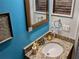 Well-appointed bathroom with granite countertop and stylish fixtures at 124 Hollyhock Ct, Kissimmee, FL 34743