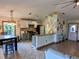Modern kitchen with open layout and breakfast bar at 124 Hollyhock Ct, Kissimmee, FL 34743