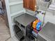 Stacked LG washer and dryer in laundry room at 124 Hollyhock Ct, Kissimmee, FL 34743