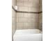 Clean bathroom with tile shower/tub combo at 124 Lancaster Dr, Davenport, FL 33897
