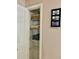 Bedroom closet with wire shelving, providing ample storage space at 124 Lancaster Dr, Davenport, FL 33897