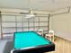 Fun game room with pool table and seating at 124 Lancaster Dr, Davenport, FL 33897