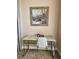 Home office with a marble desk, comfortable chair and inspiring artwork at 124 Lancaster Dr, Davenport, FL 33897