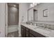 Bathroom with a double sink and a bathtub at 13265 Alderley Dr, Orlando, FL 32832