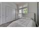 Bright bedroom with a comfortable bed and closet at 13265 Alderley Dr, Orlando, FL 32832