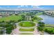 Aerial view of community entrance and landscaping at 13265 Alderley Dr, Orlando, FL 32832