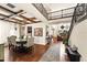 Grand foyer featuring wood floors, high ceilings, wood beams, iron staircase, and open floor plan at 13596 Gorgona Isle Dr, Windermere, FL 34786