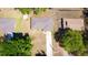 Aerial view of the neighborhood with single-story homes and backyard storage at 18148 Villa City Rd, Groveland, FL 34736