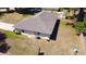 Aerial shot of the home showing the backyard and detached shed at 18148 Villa City Rd, Groveland, FL 34736