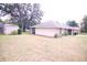 Charming single-story home with a spacious yard and detached shed at 18148 Villa City Rd, Groveland, FL 34736