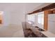 Modern open concept kitchen with breakfast bar, stainless steel appliances, and lots of natural light at 18148 Villa City Rd, Groveland, FL 34736