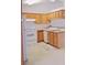 Efficient kitchen featuring appliances and cabinets at 18148 Villa City Rd, Groveland, FL 34736