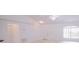 Open living space with vaulted ceilings and ample light at 18148 Villa City Rd, Groveland, FL 34736