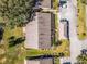 Overhead aerial of townhome roofs and carports, illustrating the property's layout and surrounding green spaces at 2214 Se Sawgrass Ct, Winter Haven, FL 33884