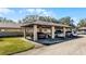 Community carport providing covered parking spaces for residents and visitors, enhancing convenience at 2214 Se Sawgrass Ct, Winter Haven, FL 33884