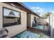Exterior view showcasing the patio area with seating, enhancing outdoor living at 2214 Se Sawgrass Ct, Winter Haven, FL 33884